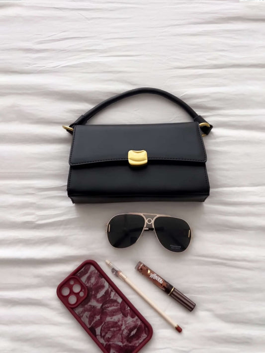 Kompakte Handtasche mit Metallverschluss