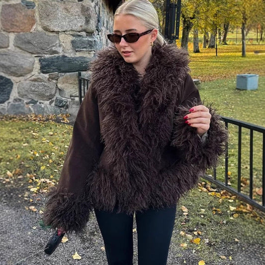 Weit geschnittene Jacke mit strukturiertem Kragen und glattem Textil