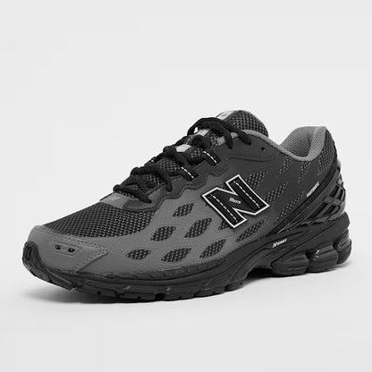 New Balance 1906 Grau / Schwarz