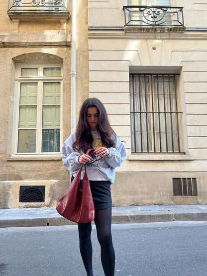 Weiche Schultertasche mit breitem Trageriemen