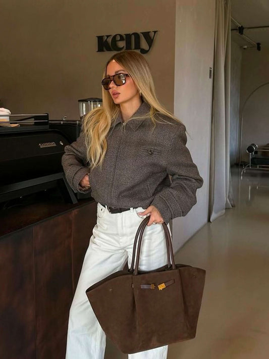 Handtasche mit Tragegriffen und Schulterriemen