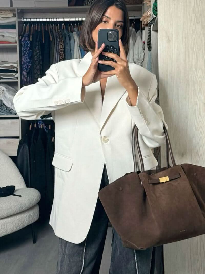 Handtasche mit Tragegriffen und Schulterriemen